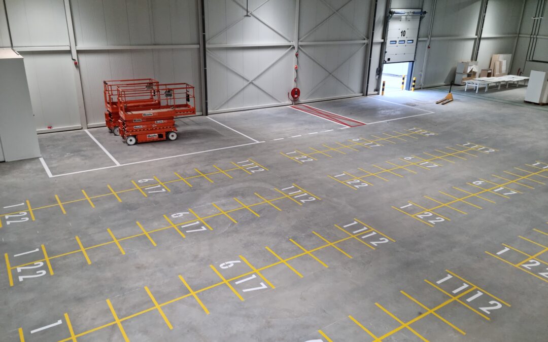 Belijning voor opstelvakken en looppaden in nieuwe loods